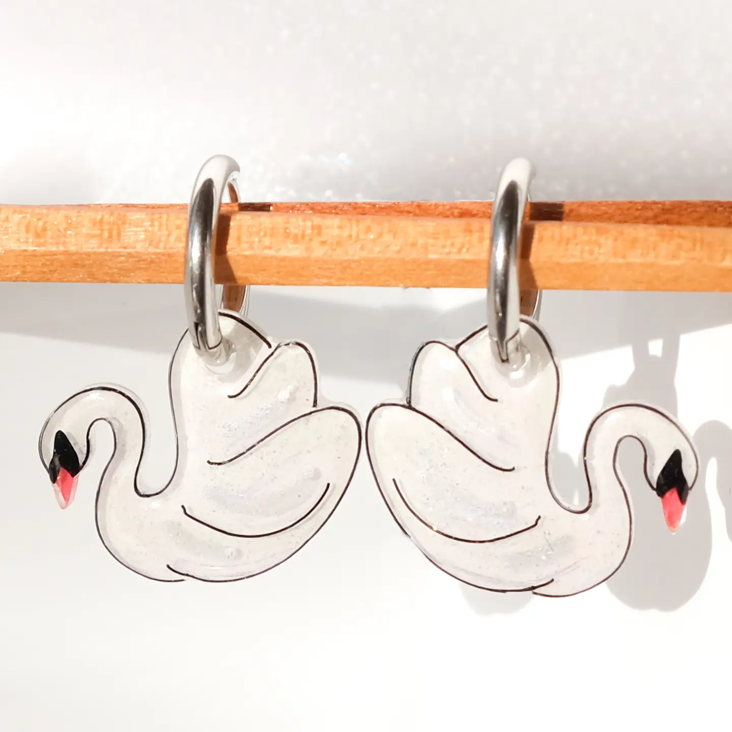 White Swan Elegant Silver Huggie Hoop Earrings