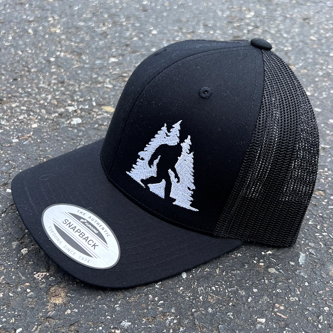 Sasquatch in Trees Trucker Hat-Black